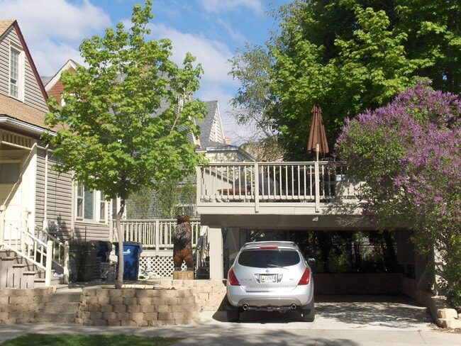 Carport-deck-parking - 1562 E Irving Plz Unit Lower Front 1 bedroom