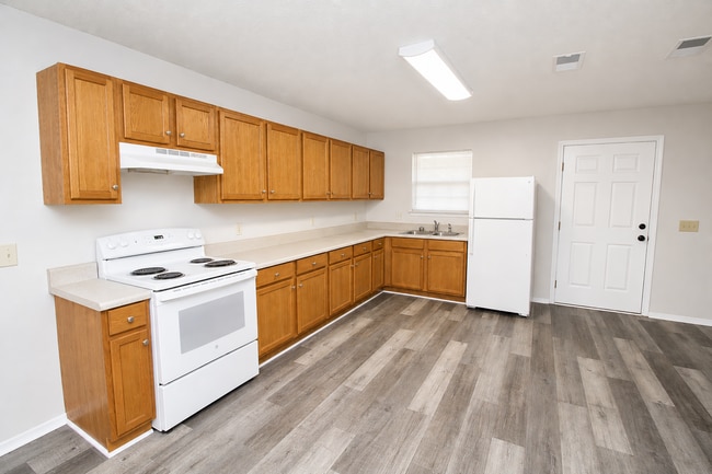 Photo - 3BR Cottage-Style Home in Milton with LVP Flooring, Partially Fenced Yard & Convenient Location N...
