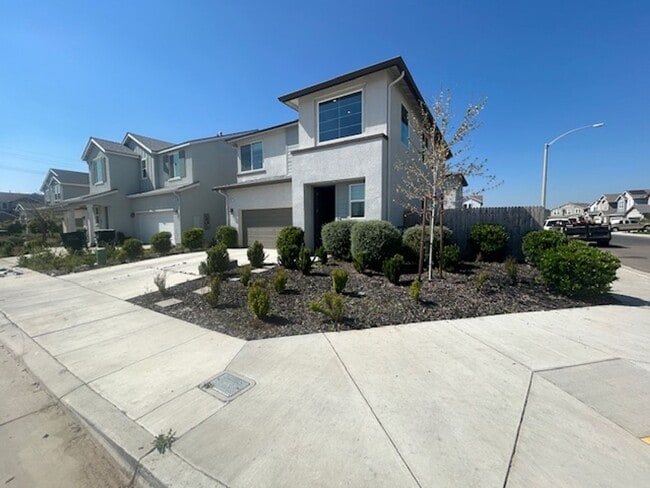 Building Photo - Two story on corner lot.