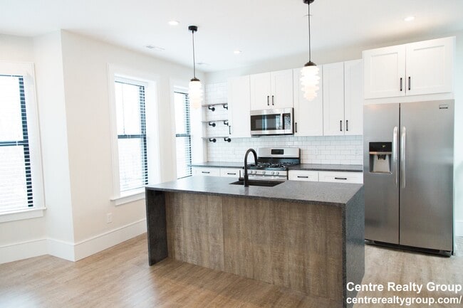 Building Photo - 1522 Tremont St Unit 3 Rental