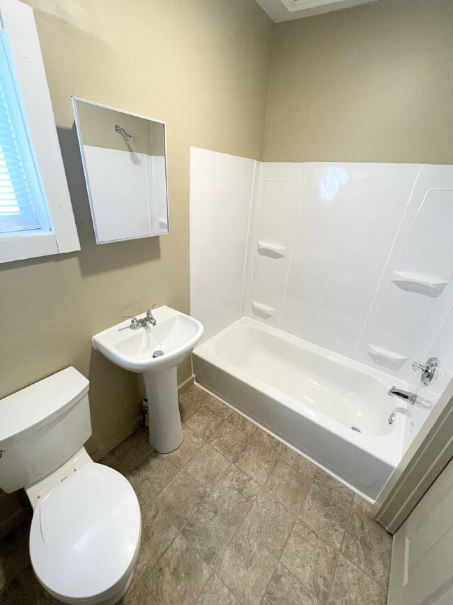 Photo - 2 Bedroom with open-concept living areas