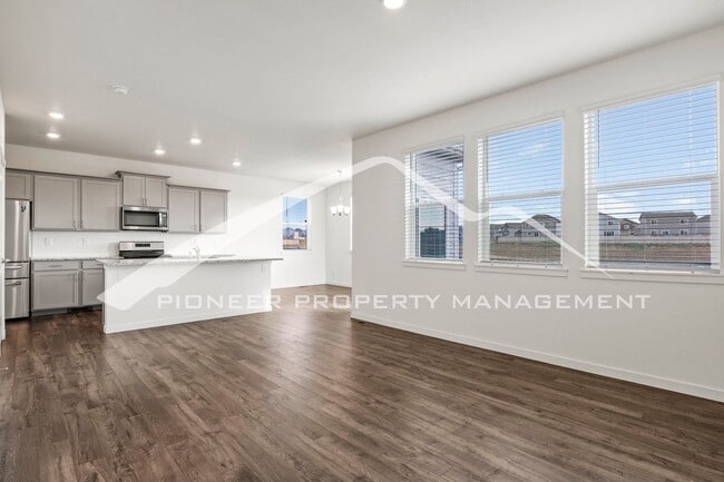 Photo - Modern 4-Bed, 2.5-Bath Home with 2 car garage, AC and Private Enclosed Yard