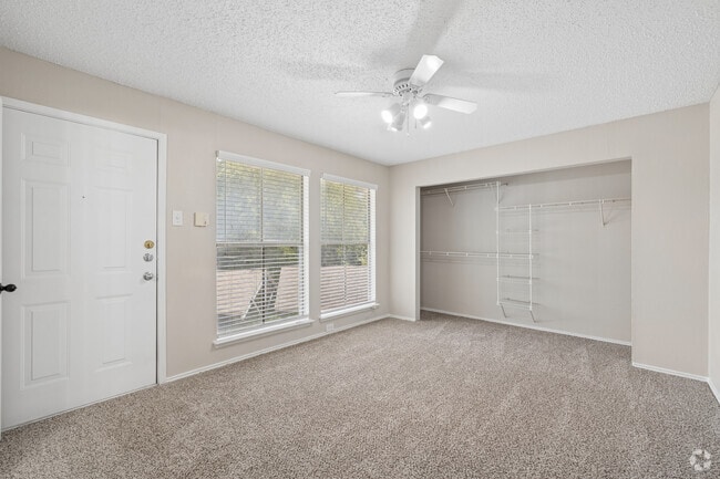 2BR, 2B.5BA - 1,065SF - Primary Bedroom