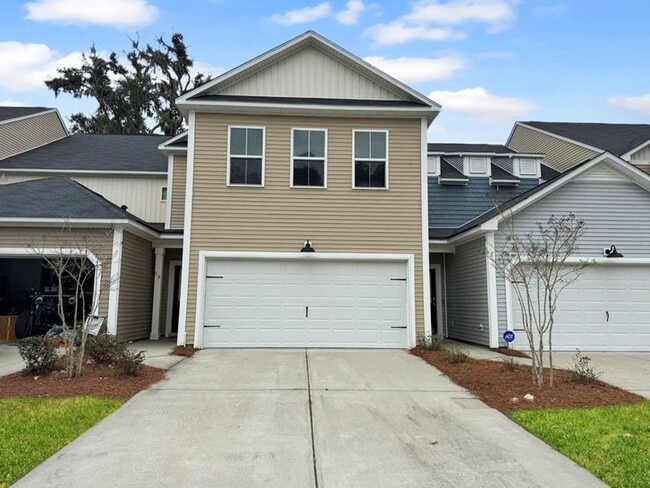 Building Photo - Pristine 2 story Townhome located in sough...