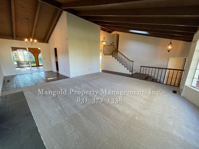 Photo - Beautiful 4-bed 2-bath Home with Cozy Fireplace, Front and Back Yards and Large Windows!