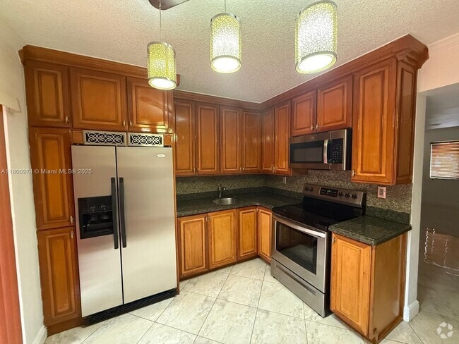Building Photo - 680 NW 82nd Pl Rental