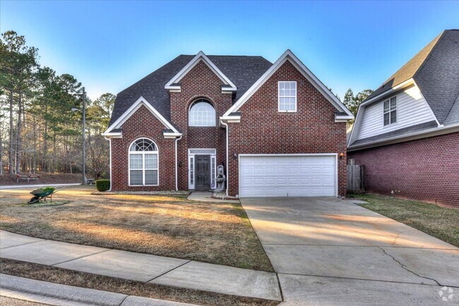 Building Photo - Beautiful all brick, 4 BR, 2.5 BA home for...