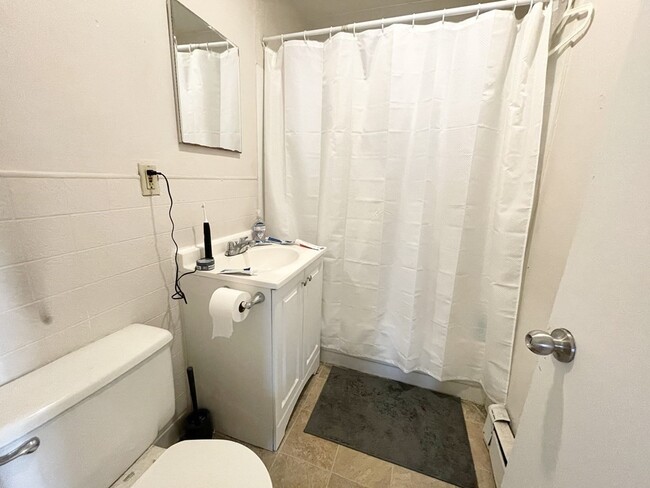 Photo - 1572 Tremont St Apartments Unit uni 2 3-bed 1-bath