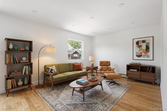 Building Photo - 58-14 84th St Unit 2