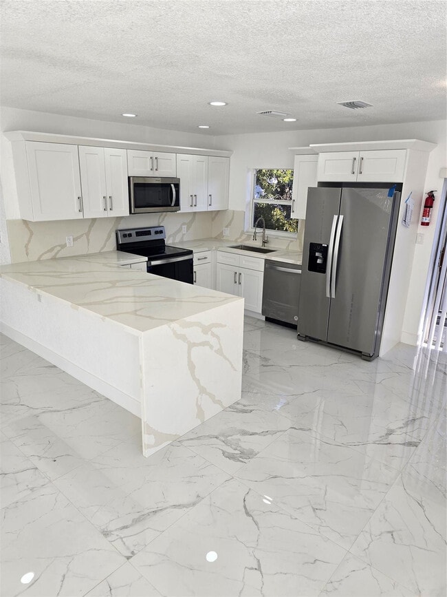 Photo - 1848 NW 55th Ave Unidad 4x