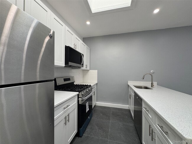 Building Photo - 209-211-211 Main St Unit 2S