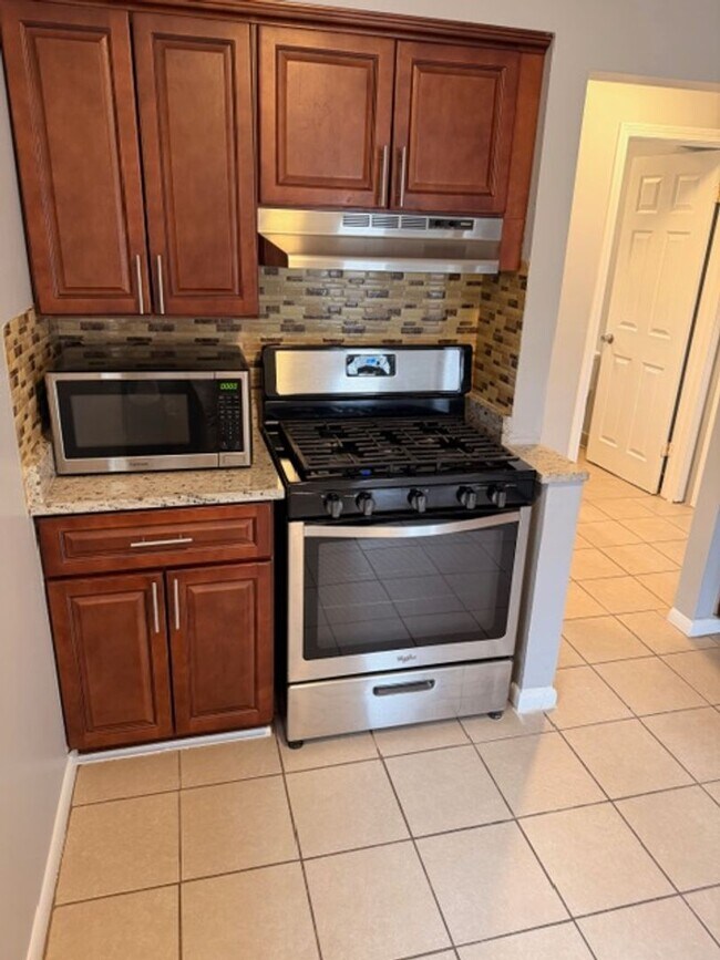 Photo - Charming 3-Bedroom Home with Private Yard in a Prime Location!