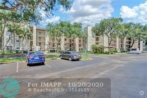 Building Photo - 9420 Poinciana Pl Unit 310 Rental