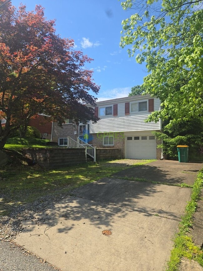 Photo - Charming 3-Bedroom Pittsburgh Home with Fireplace, Balcony & Garage Parking