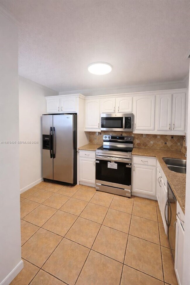 Photo - 15761 SW 137th Ave Unit 202