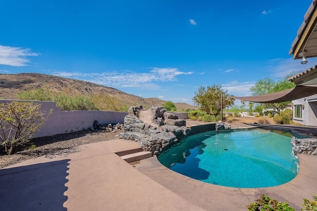 Building Photo - Coming Soon! 4 bed, 3.5 bath with a beautiful pool & views! No HOA - Available 02/01/2026