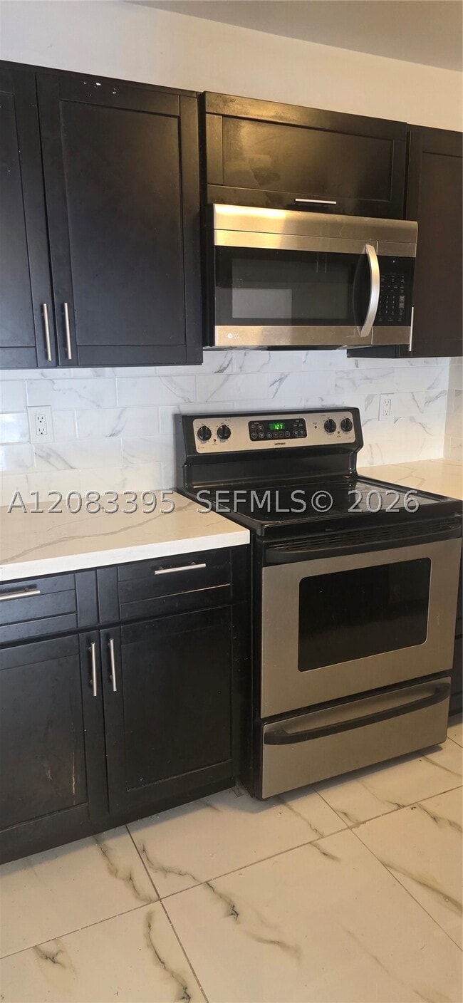 Photo - 900 NE 209th Terrace Unit 203-31