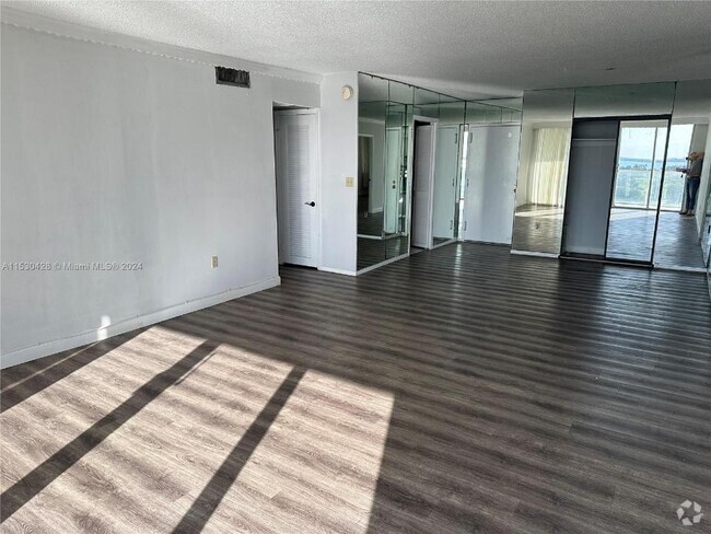 Building Photo - 5750 Collins Ave Unit 12D Rental