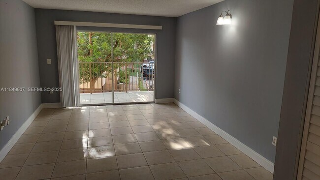 Building Photo - 15231 SW 80th St Unit 209