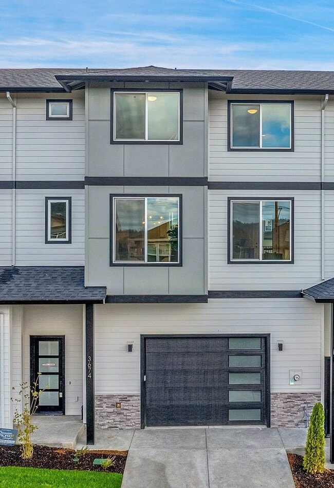 Building Photo - Brand New Spacious and Light-Filled Condo Offering an Open Layout, Island Kitchen, and Outdoor Deck