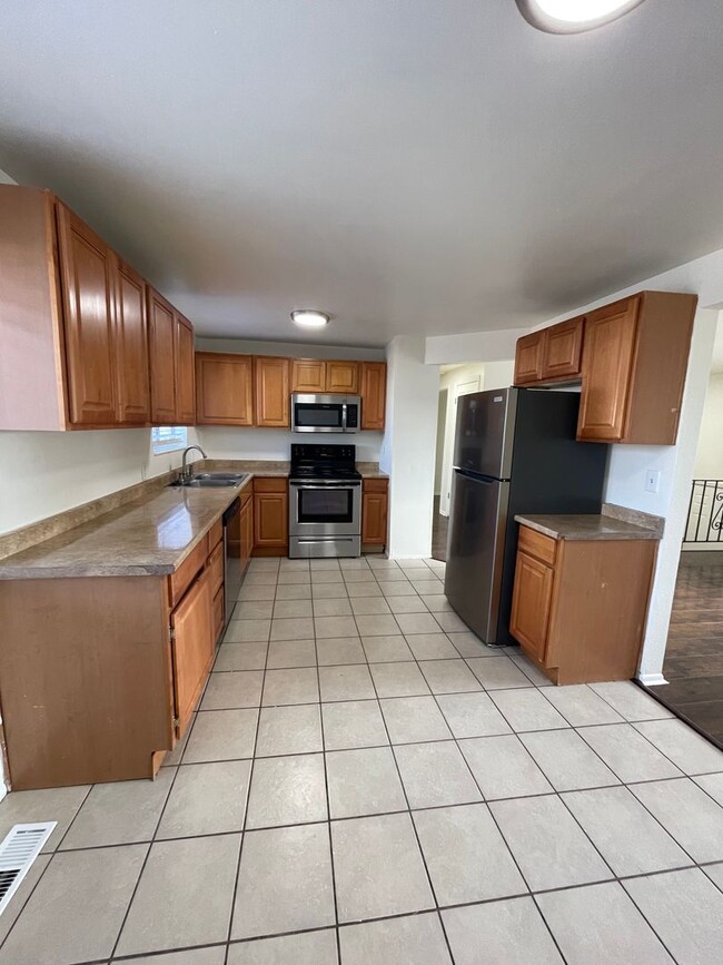 Building Photo - West Jordan Remodeled Four Bedroom; Garage; New Kitchen Cabinets; Fenced Yard; Central Air