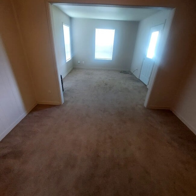 Reverse - Dining Area Looking Into the Kitchen