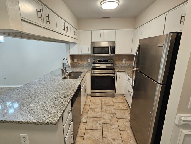 Photo - 1507 Military Cutoff Rd Unit 208