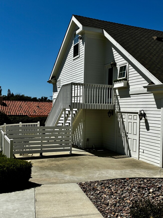 Patio, entry & access to laundry below - 649 Crest Dr Unit Guest House