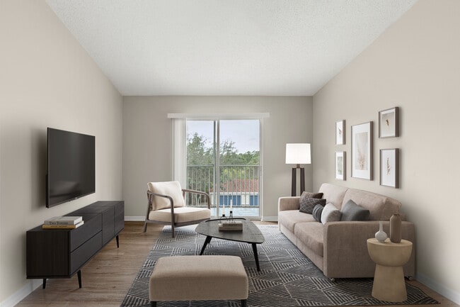 Homes feature hardwood-style floors and private screened balcony or patio - Pine Lakes Preserve