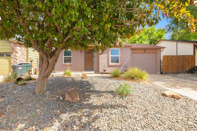 Building Photo - Updated 4-Bedroom Home with Central A/C & Xeriscaped Yard