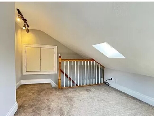 Attic Bedroom (Updated vinyl flooring)