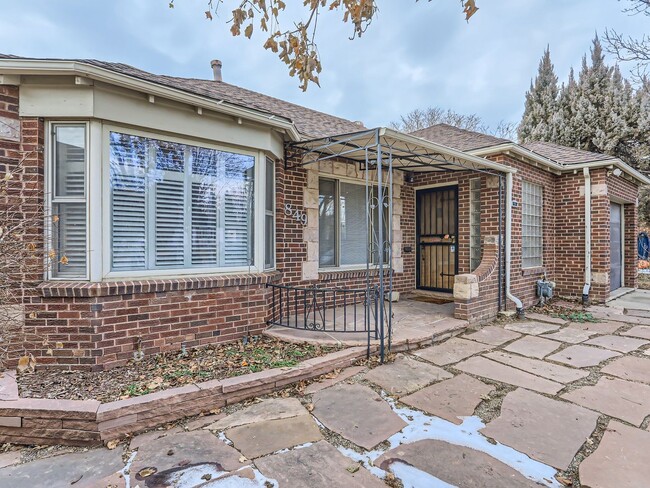 Photo - Evolve Real Estate: Available 8/8/26 Brick Tudor with Large Yard and Finished Basement!