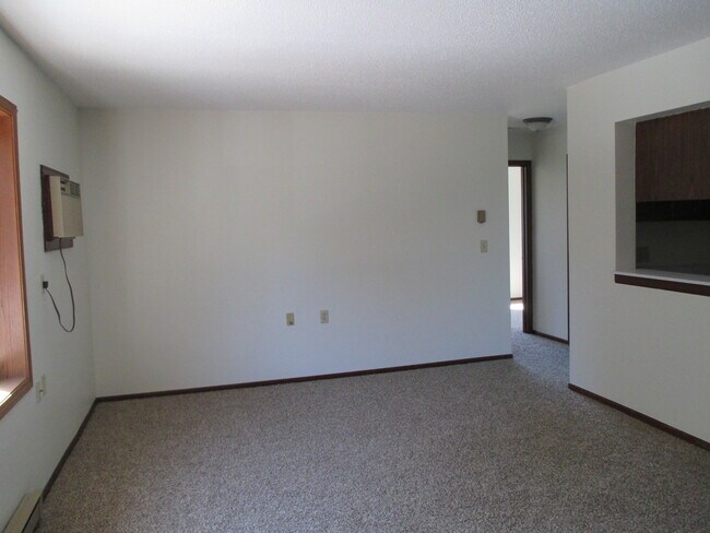 Sala de estar de los apartamentos Larson - Larson Apartments