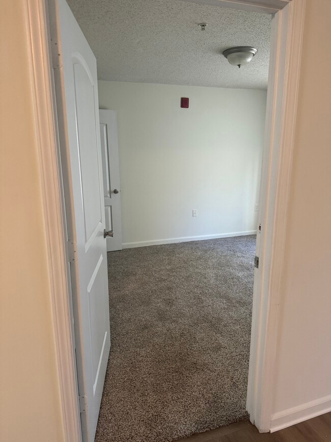 Bedroom on the left - 3000 S Adams St Unit 313