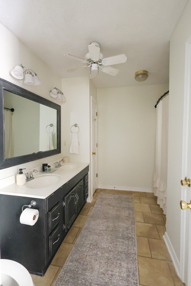 Master Bathroom with 2 storage closets. - 15 Caitlin Ave