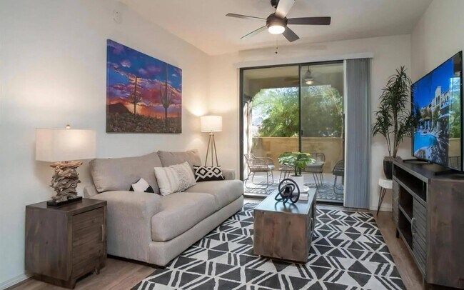 Living Room with Ceiling Fan and Patio Access - Desert Parks Vista