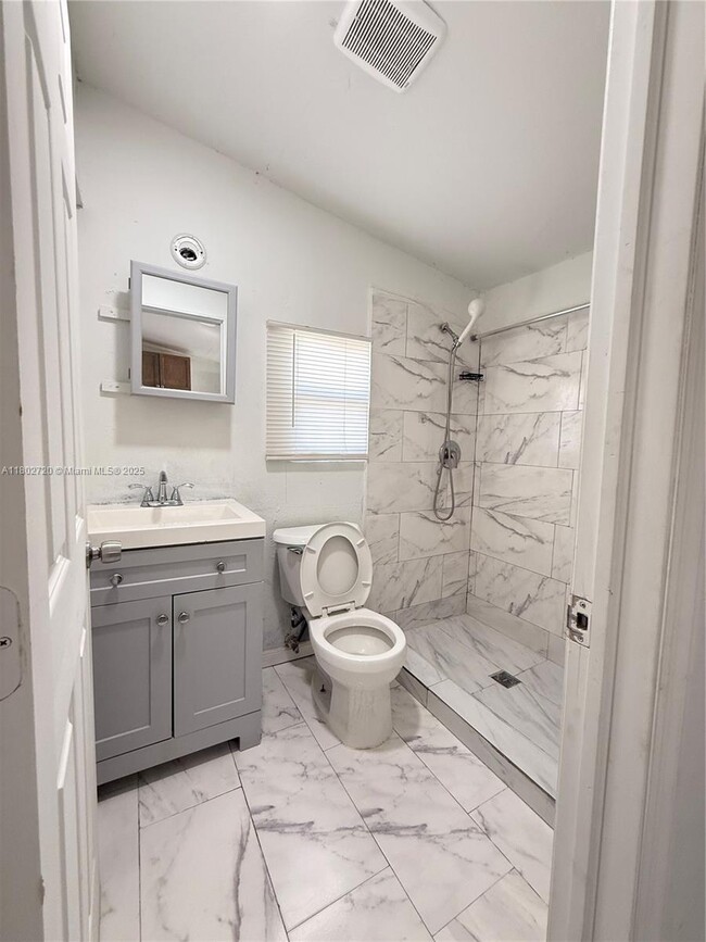 Photo - 2460 NW 61st St Apartment Unit C