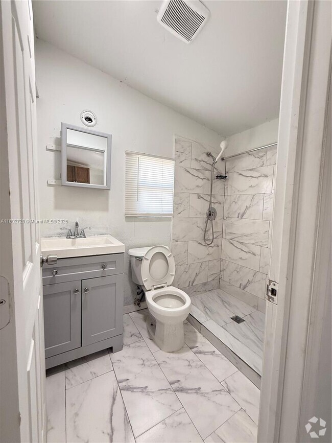 Building Photo - 2460 NW 61st St Unit C Rental