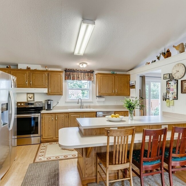 Photo - 9040 W 64th Pl