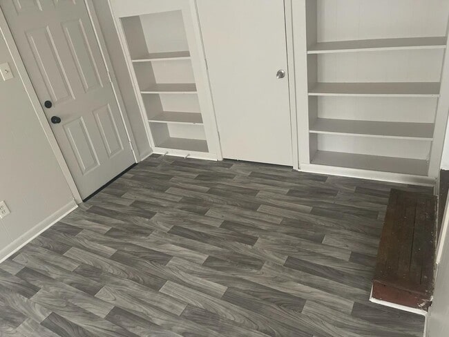 2nd Living Area. It's Sunken With Built-Ins.