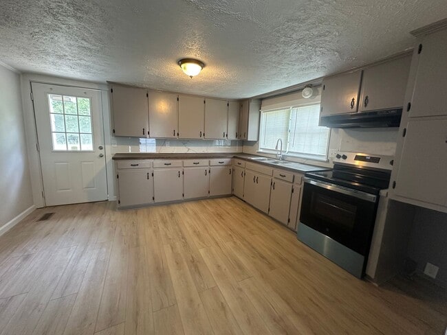 Photo - Welcome to the newly renovated gem located in the heart of Russellville, AR.