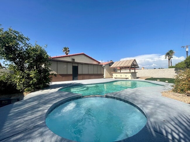 Building Photo - AVAILABLE NOW!! 3 Bedroom/2 Bathroom Cathedral City Pool Home!!  MOVE IN SPECIAL HALF OFF ONE MON...