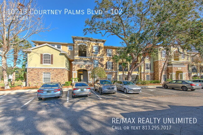 Photo - 10213 Courtney Palms Blvd Unidad 102 Rental