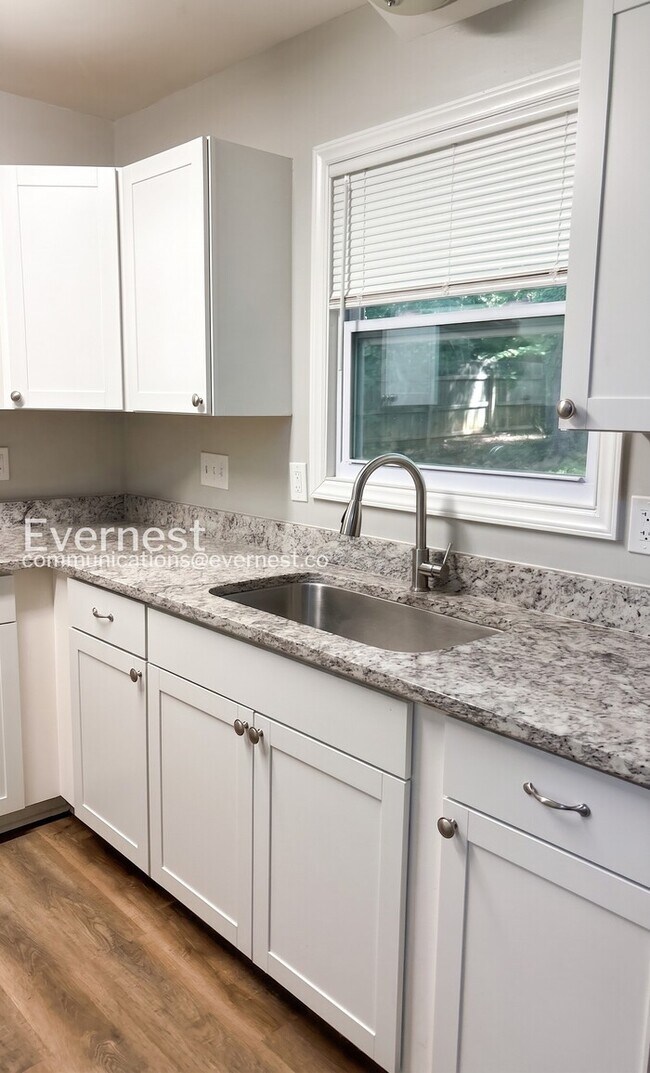 Photo - 3 Bed, 2 Bath Home with Fenced Backyard and Attached Garage / Available Soon!