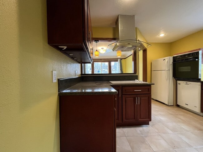 Photo - Classic Brick Portland Home on Stark Street with Dual Living Areas and Two Full Kitchens