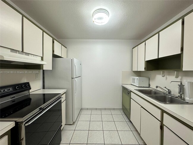 Photo - 4670 W 13th Ln Condo Unit 305