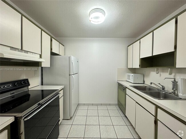 Building Photo - 4670 W 13th Ln Unit 305 Rental