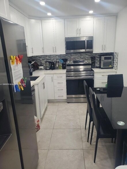 Building Photo - 10777 W Sample Rd Unit 1217 Rental