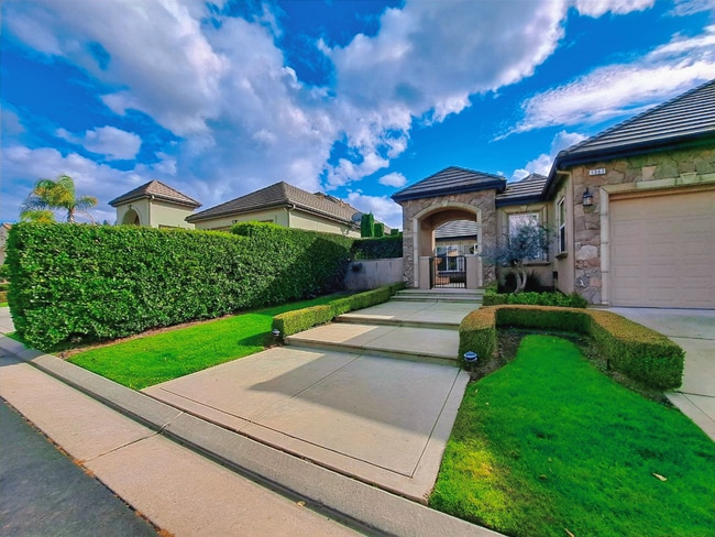 Photo - Custom Clovis Residence in Gated Community | Spacious Layout & 3-Car Garage!