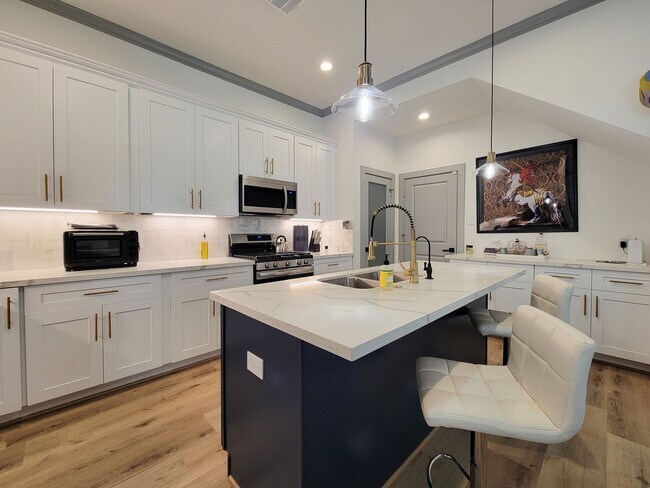 Photo - This 4-bedroom, 3-bathroom, two-story resi...